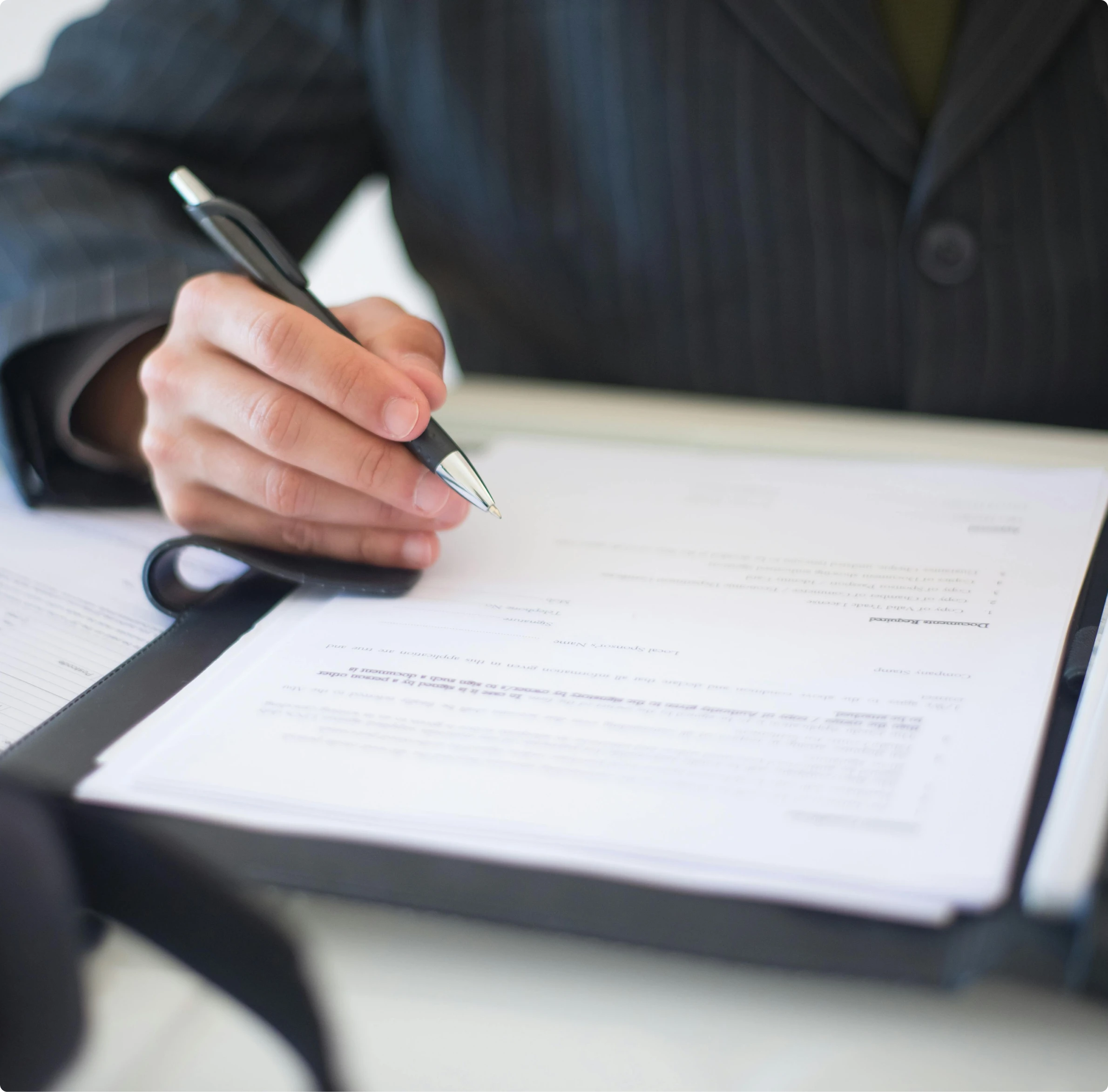 Signing mortgage loan documents with guidance from MambaCap Financial mortgage broker services for home loans and real estate financing.